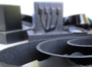 Tefillin worn on the head, One side has a Shin with 4 heads, it usually has three